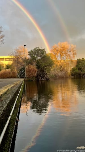 Double Rainbows Over Industrial Water